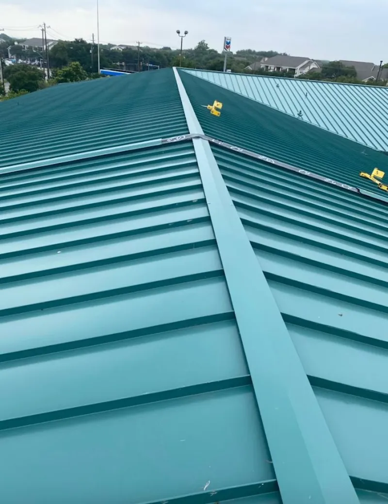 Green commercial metal roof ridge and valley for Metal Roof Repair in Medfield
