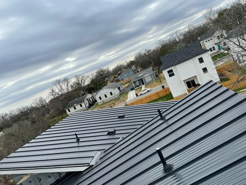 Standing seam metal roof panels with vents for Skylight Repair in Medfield